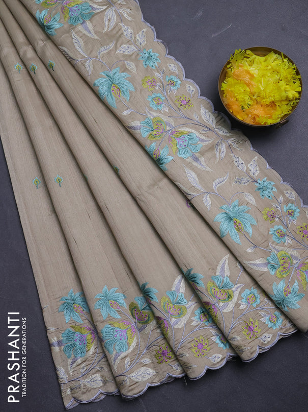 Semi raw silk saree beige with embroidery buttas and floral embroidery border