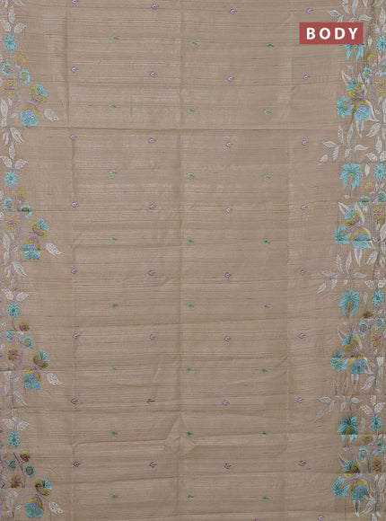 Semi raw silk saree beige with embroidery buttas and floral embroidery border