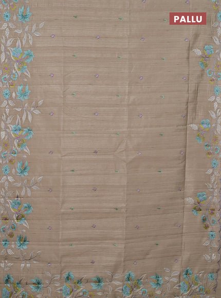 Semi raw silk saree beige with embroidery buttas and floral embroidery border