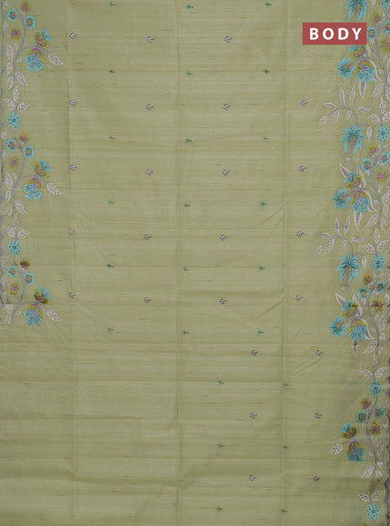 Semi raw silk saree pista green with embroidery buttas and floral embroidery border