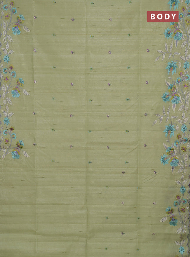 Semi raw silk saree pista green with embroidery buttas and floral embroidery border