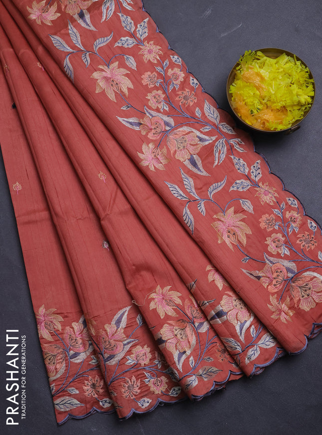 Semi raw silk saree rust shade with embroidery buttas and floral embroidery border