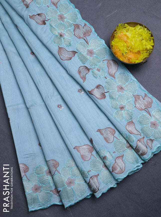 Semi raw silk saree pastel blue with embroidery buttas and floral embroidery border