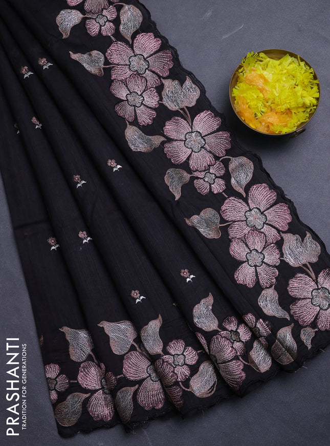 Semi raw silk saree black with embroidery buttas and floral embroidery border