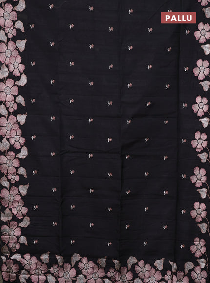 Semi raw silk saree black with embroidery buttas and floral embroidery border