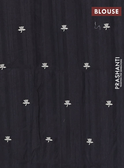 Semi raw silk saree black with embroidery buttas and floral embroidery border