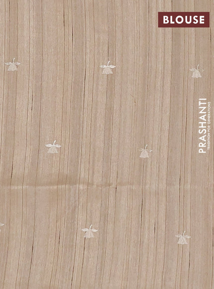 Semi raw silk saree beige with embroidery buttas and floral embroidery border