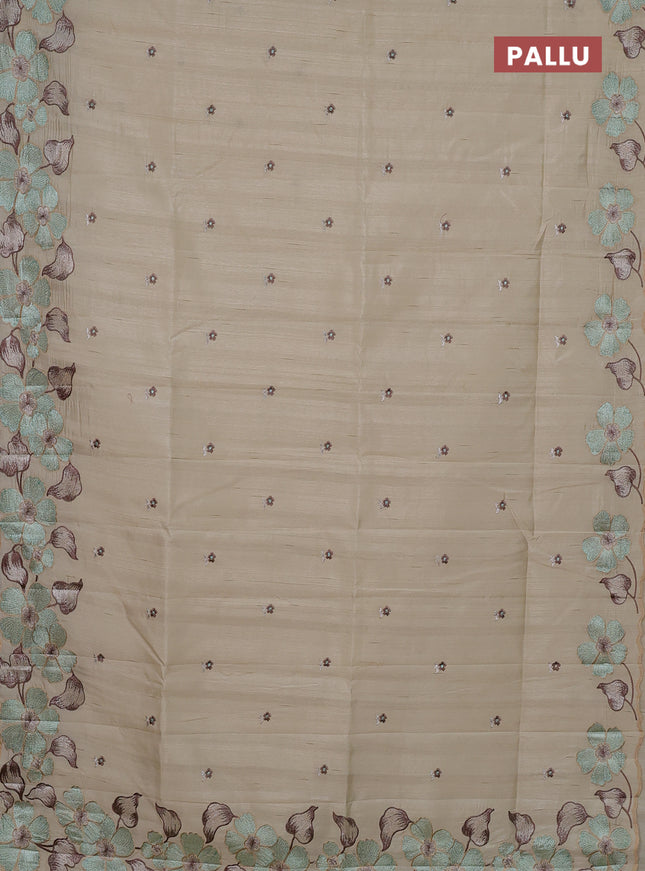 Semi raw silk saree beige with embroidery buttas and floral embroidery border