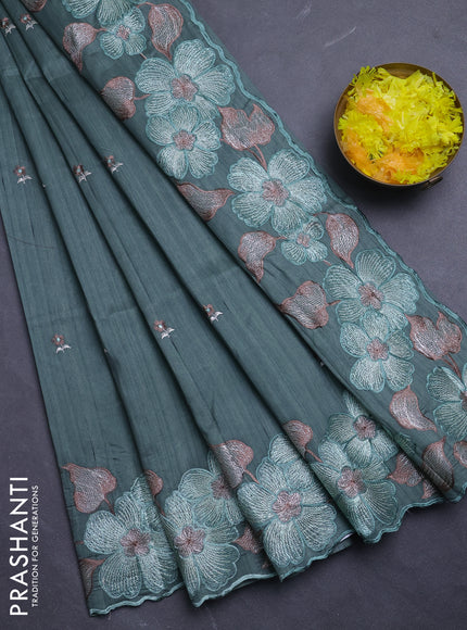 Semi raw silk saree pastel green shade with embroidery buttas and floral embroidery border