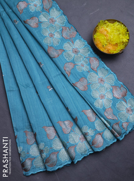 Semi raw silk saree teal blue with embroidery buttas and floral embroidery border