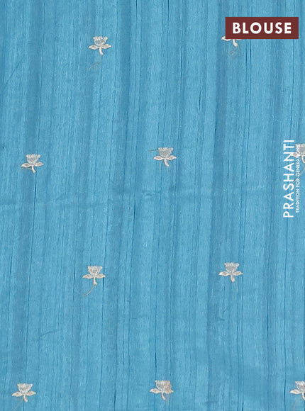 Semi raw silk saree teal blue with embroidery buttas and floral embroidery border
