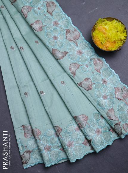 Semi raw silk saree pastel blue with embroidery buttas and floral embroidery border
