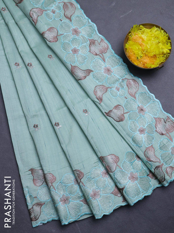 Semi raw silk saree pastel blue with embroidery buttas and floral embroidery border