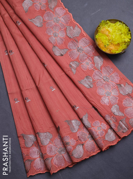 Semi raw silk saree rust shade with embroidery buttas and floral embroidery border