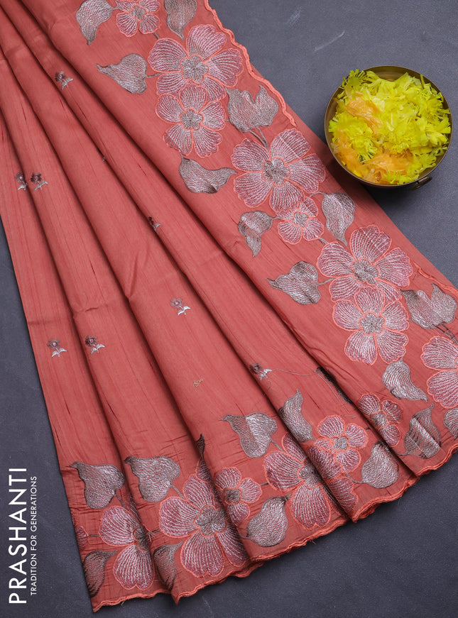 Semi raw silk saree rust shade with embroidery buttas and floral embroidery border