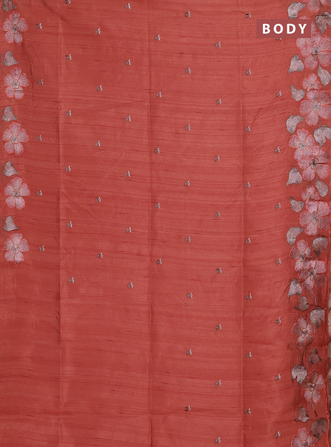 Semi raw silk saree rust shade with embroidery buttas and floral embroidery border