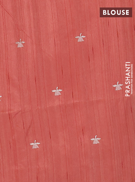 Semi raw silk saree rust shade with embroidery buttas and floral embroidery border