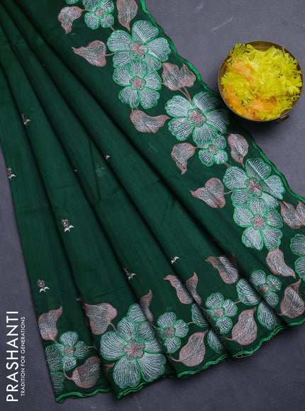 Semi raw silk saree bottle green with embroidery buttas and floral embroidery border
