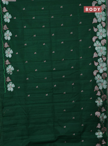 Semi raw silk saree bottle green with embroidery buttas and floral embroidery border