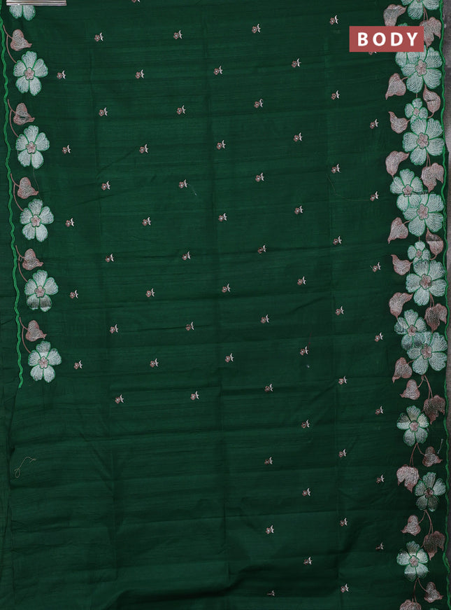 Semi raw silk saree bottle green with embroidery buttas and floral embroidery border
