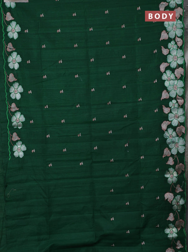 Semi raw silk saree bottle green with embroidery buttas and floral embroidery border