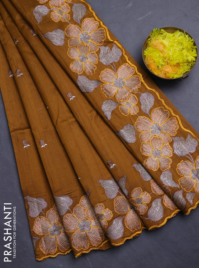 Semi raw silk saree dark mustard with embroidery buttas and floral embroidery border
