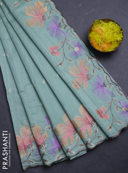 Semi raw silk saree pastel green with embroidery buttas and floral embroidery border