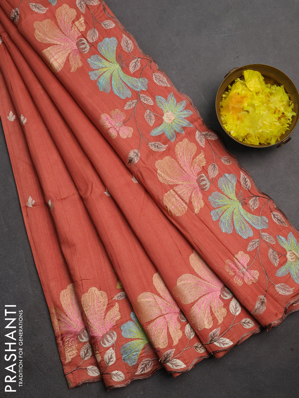Semi raw silk saree rust shade with embroidery buttas and floral embroidery border