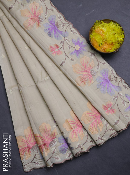 Semi raw silk saree beige with embroidery buttas and floral embroidery border