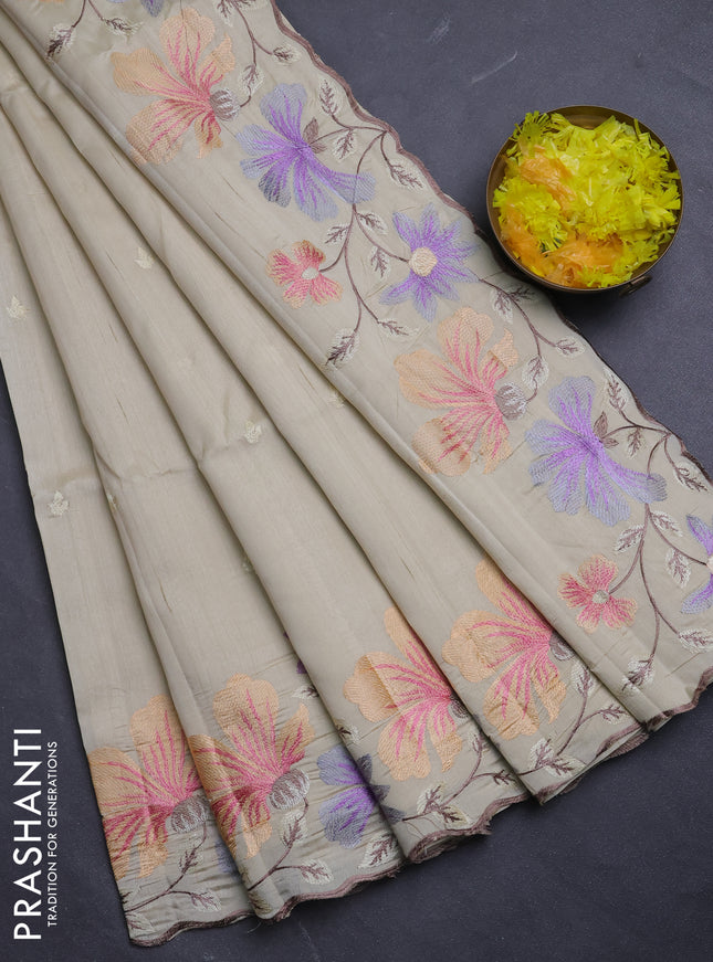 Semi raw silk saree beige with embroidery buttas and floral embroidery border