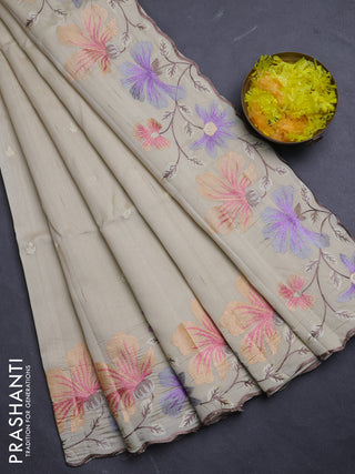 Semi raw silk saree beige with embroidery buttas and floral embroidery border