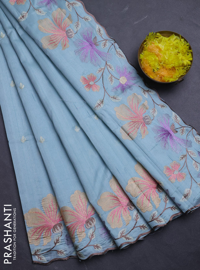 Semi raw silk saree pastel blue with embroidery buttas and floral embroidery border