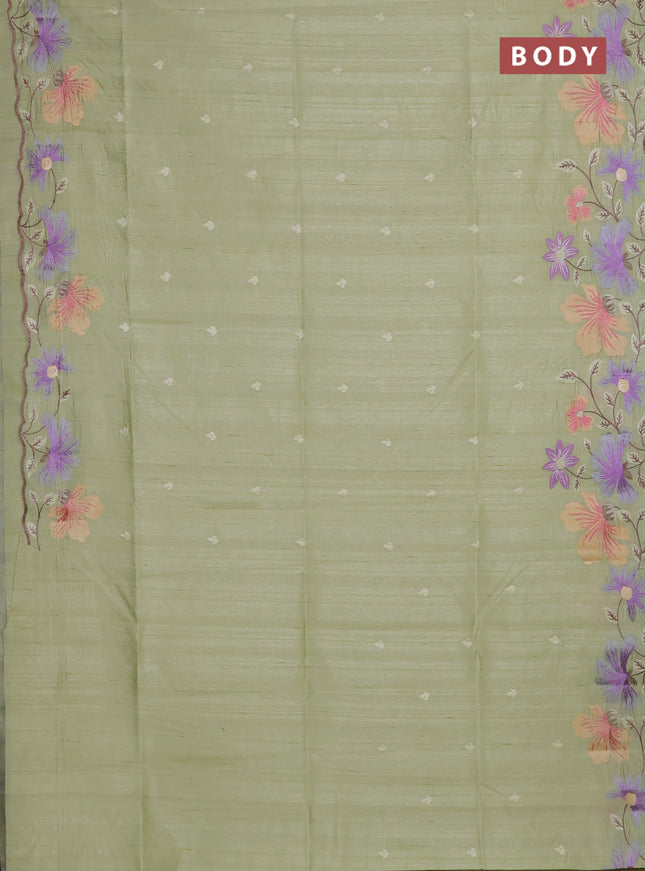 Semi raw silk saree pista green with embroidery buttas and floral embroidery border