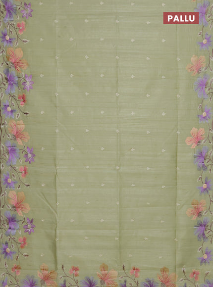 Semi raw silk saree pista green with embroidery buttas and floral embroidery border