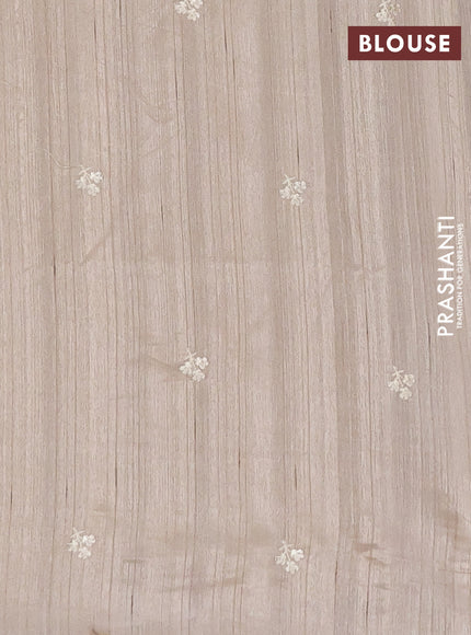 Semi raw silk saree beige with embroidery buttas and floral embroidery border