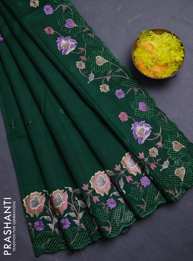 Semi raw silk saree bottle green with embroidery buttas and floral embroidery border