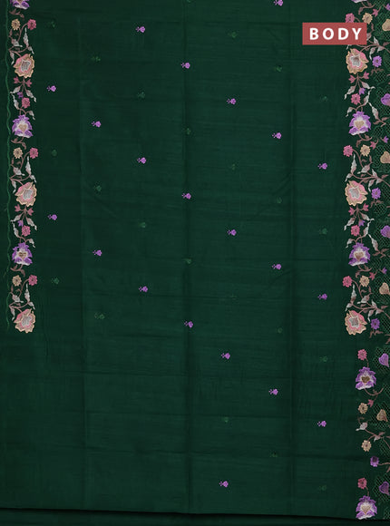 Semi raw silk saree bottle green with embroidery buttas and floral embroidery border