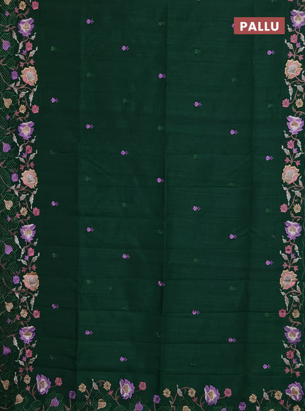 Semi raw silk saree bottle green with embroidery buttas and floral embroidery border