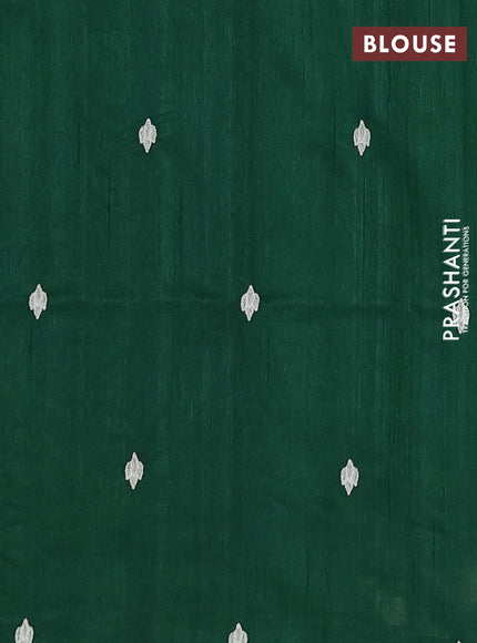 Semi raw silk saree bottle green with embroidery buttas and floral embroidery border