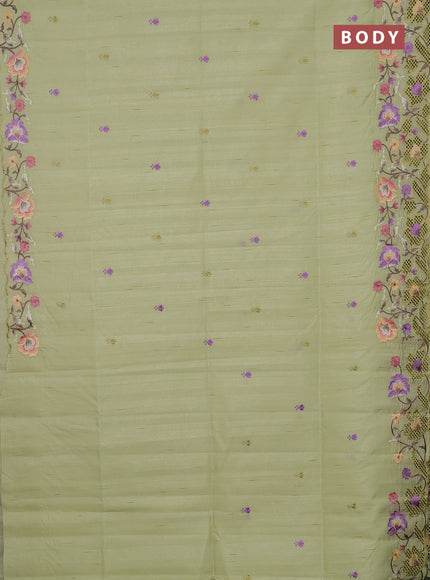 Semi raw silk saree pista green with embroidery buttas and floral embroidery border