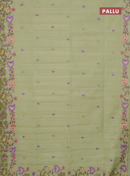 Semi raw silk saree pista green with embroidery buttas and floral embroidery border