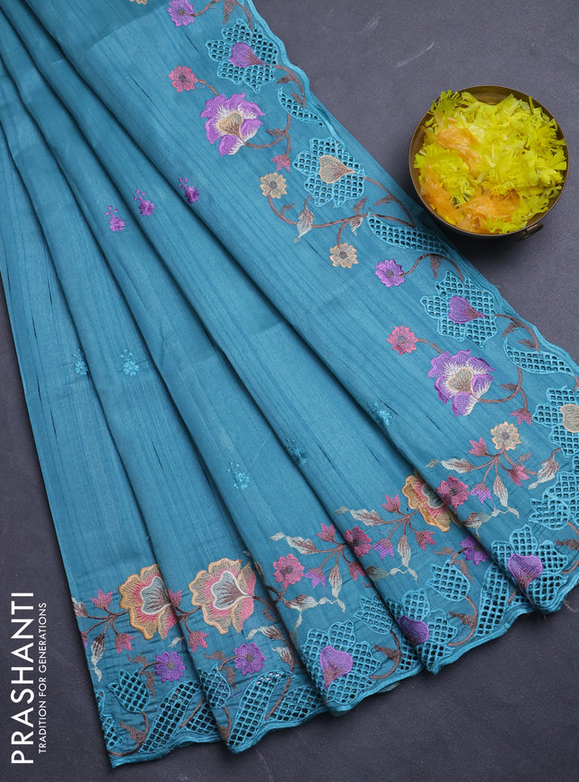 Semi raw silk saree teal blue with embroidery buttas and floral embroidery border