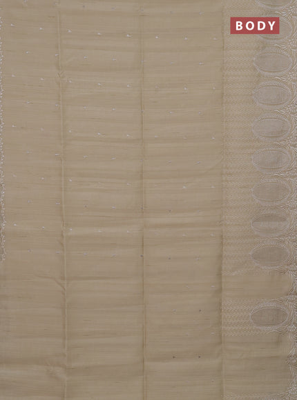 Semi raw silk saree beige with allover embroidery buttas and embroidery border