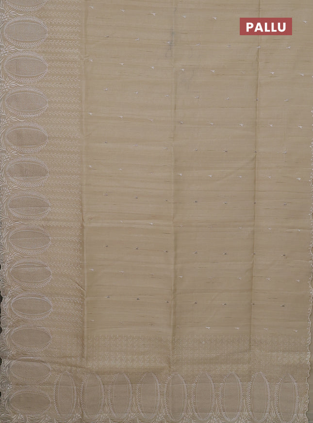 Semi raw silk saree beige with allover embroidery buttas and embroidery border