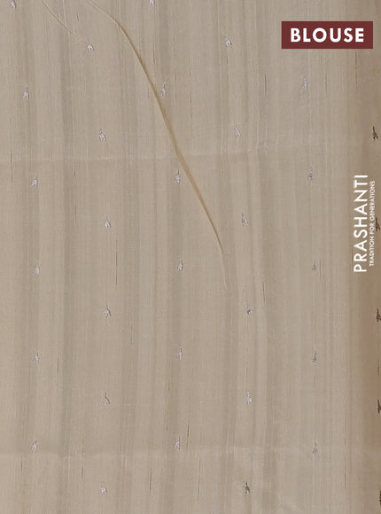 Semi raw silk saree beige with allover embroidery buttas and embroidery border