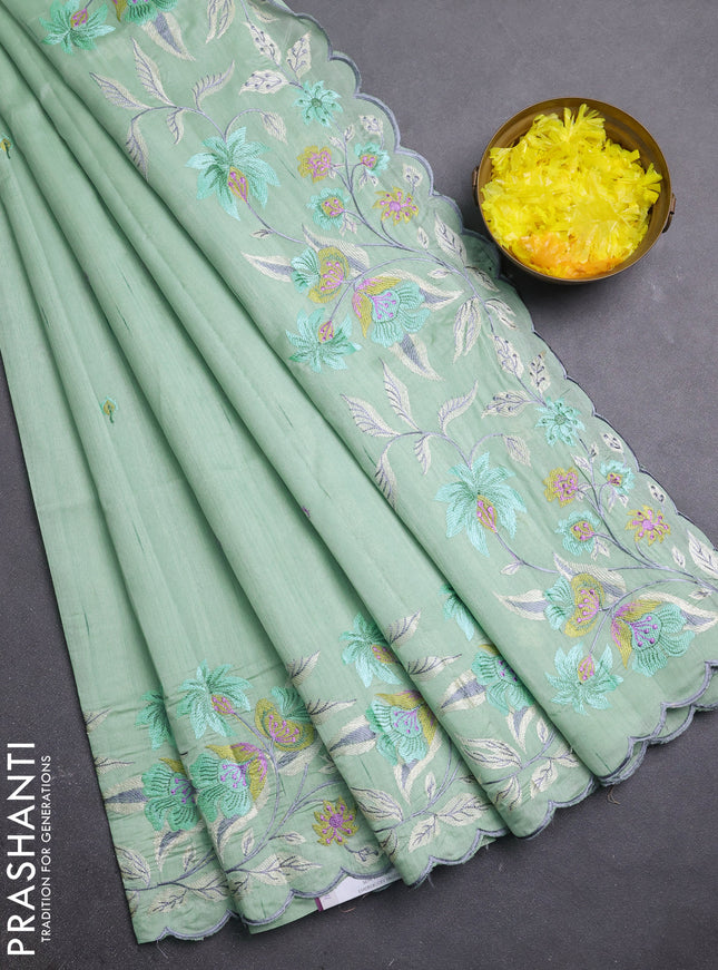 Semi raw silk saree pastel green with embroidery buttas and embriodery border