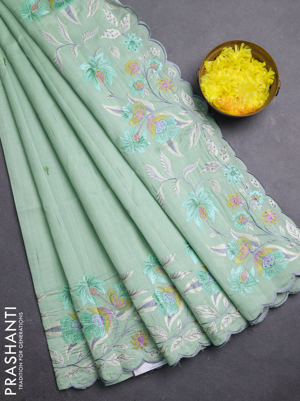 Semi raw silk saree pastel green with embroidery buttas and embriodery border