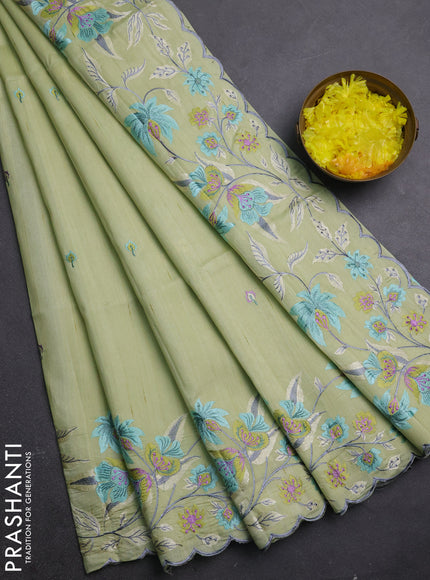 Semi raw silk saree pista green with embroidery buttas and embriodery border