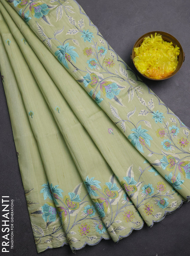 Semi raw silk saree pista green with embroidery buttas and embriodery border
