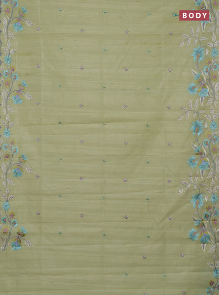 Semi raw silk saree pista green with embroidery buttas and embriodery border